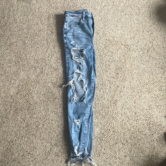 COPY - These are high rise, ripped jeans from American Eagle. The color is ligh… - Picture 4 of 6